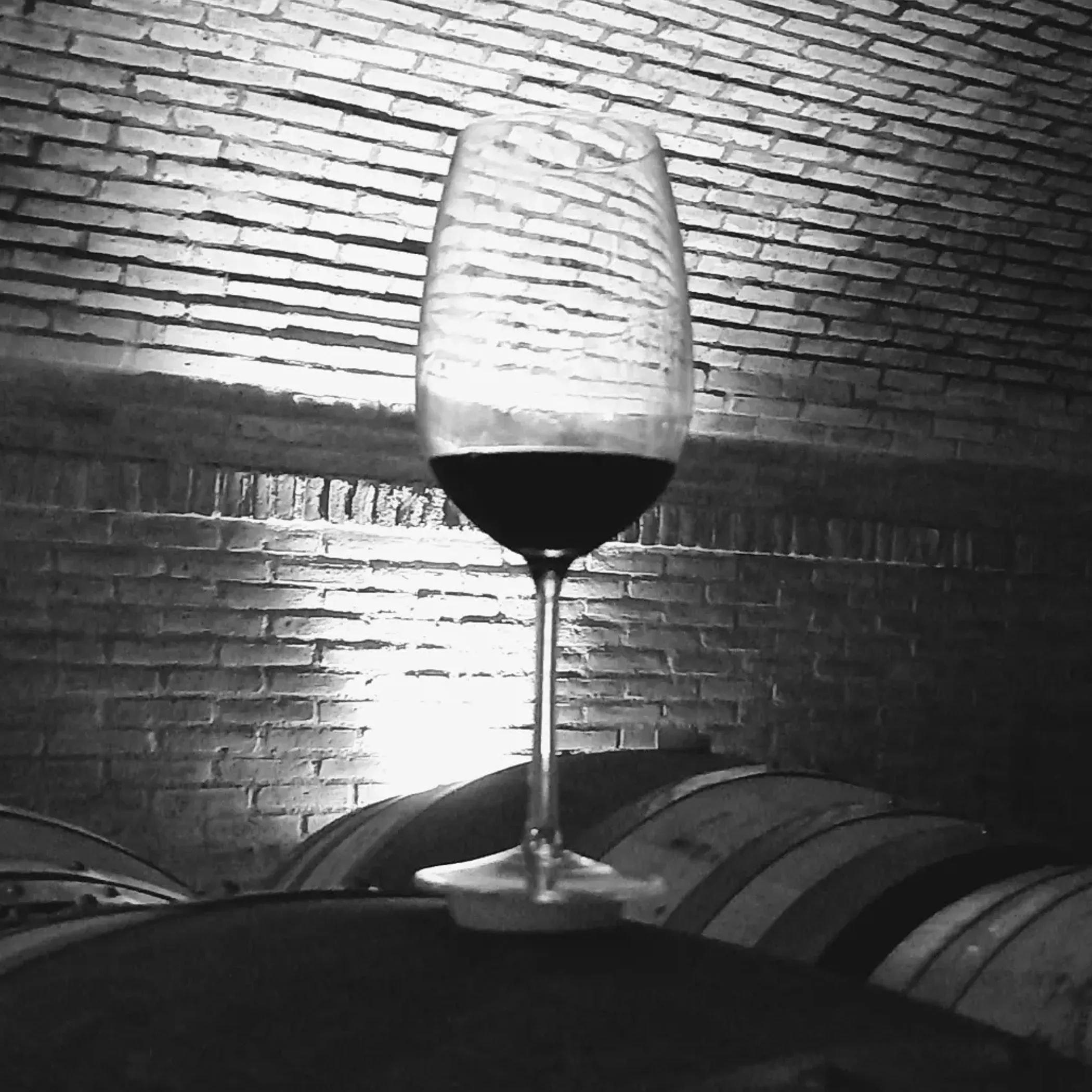 cozy red wine by fireplace pokolbin winter