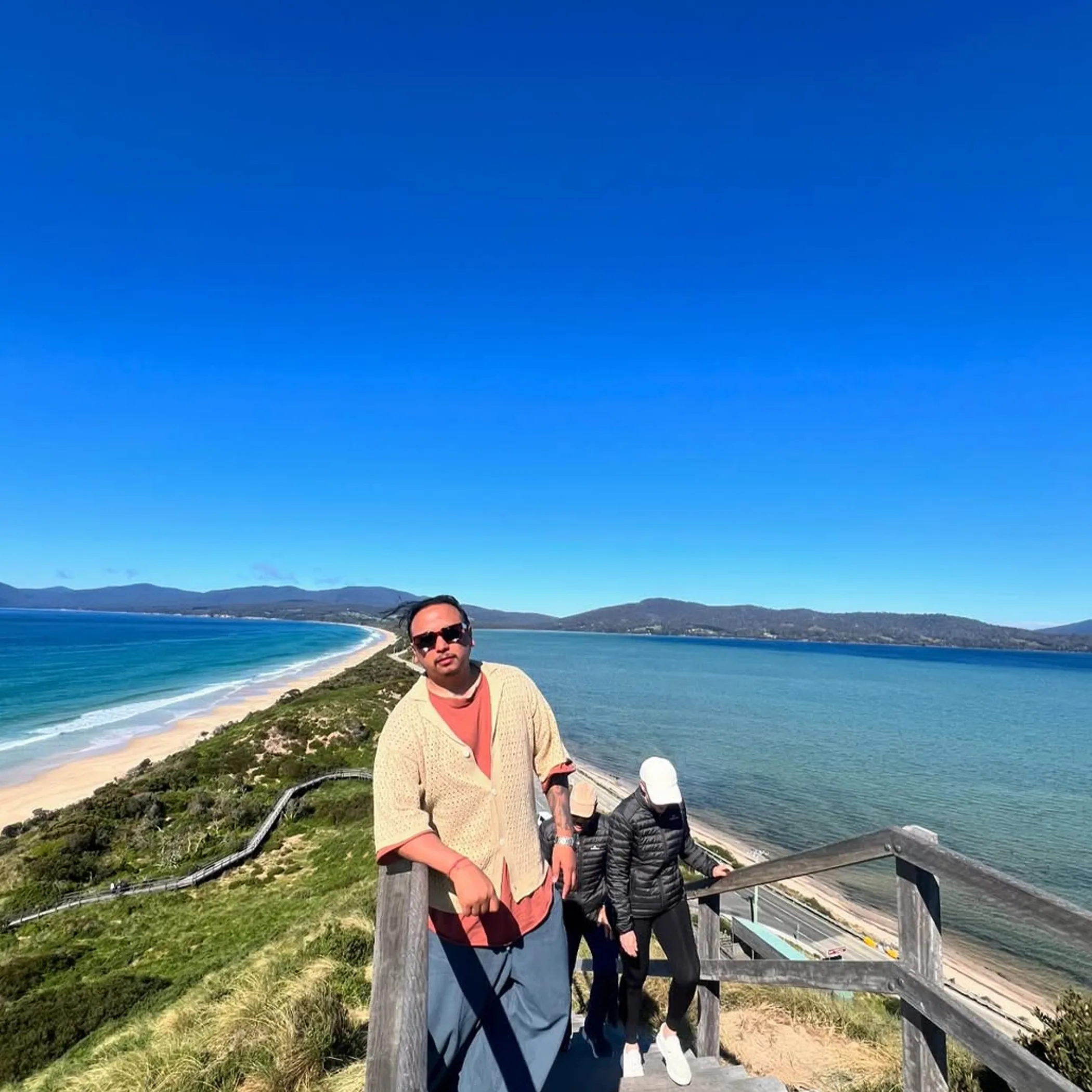 coastal walking trail by beach and water